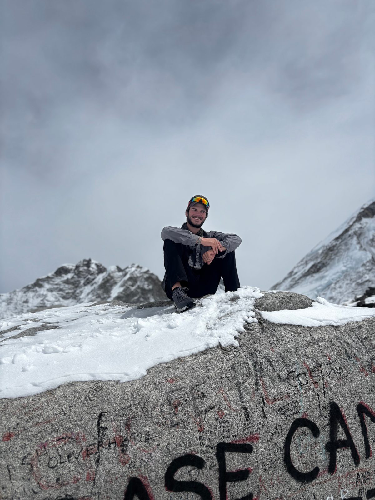 Simon Lusignan at the summit, the real trail experience behind the coaching